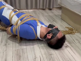 Asian man pleasured while bound and gagged with a vibrator ends in ejaculation