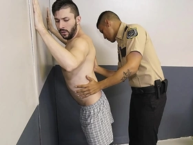 A young gay shoplifting suspect is taken into custody and punished by a gay police officer.