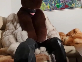 Fur fetishist in leather and boots, spanking enthusiast