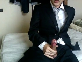 Solo pleasure of an Asian man in a hotel suite