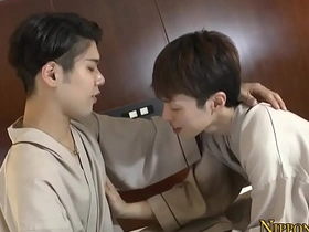Young Asian man gives blow job to gay twink