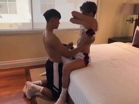 Young Asian man gets a lot of cum on his body