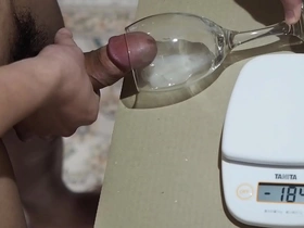 Solo Japanese boy’s masturbation experience ends with a glass full of semen.