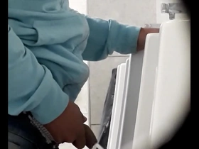 Big dick gay pissing scene in urinal