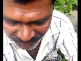 Deepthroat and blowjob with an older gay uncle outdoors in India