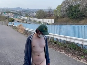 Mayu-chan, a female crossdresser, likes to undress and expose herself in a number of different ways in public places.