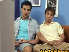 Young Japanese man giving blow job before raw doggy style sex