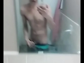 Steamy bathroom scene with hot solo action and a big cock