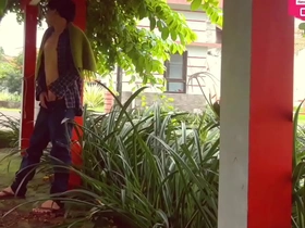 Young white boy Hansel Thio solo in China Town garden on Chinese New Year